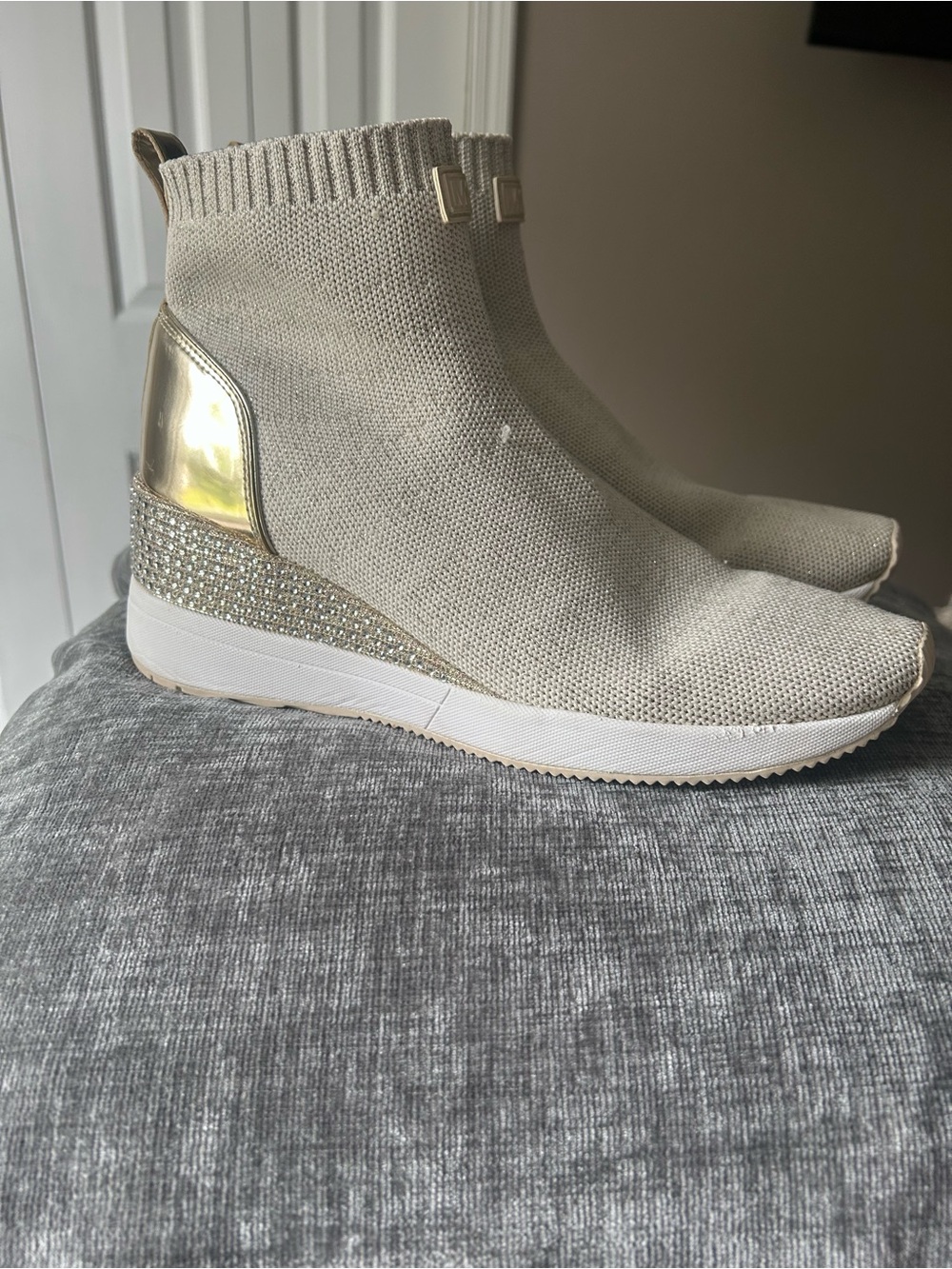 MICHAEL KORS soft  Wedge Sneaker Boot in Light Beige with Gold Accent.